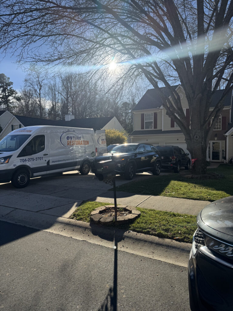 On Time Restoration Truck Parked in Charlotte, NC Driveway