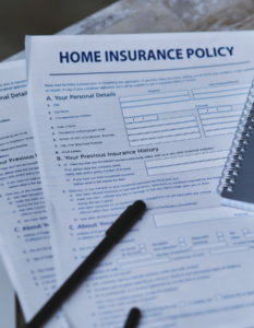 Homeowners insurance policy sitting on table