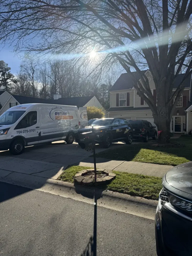 One Time Restoration service van parked outside a residential property during a restoration job.